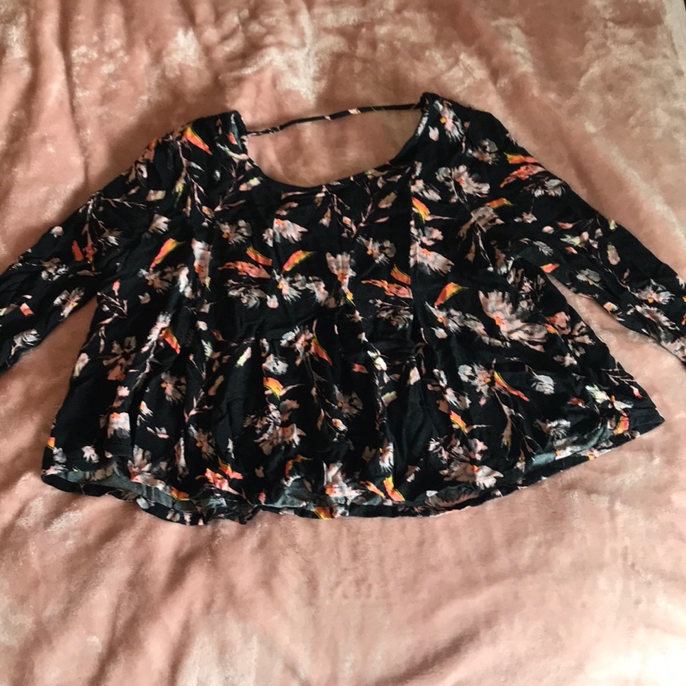 Black flowy crop top with exposed back